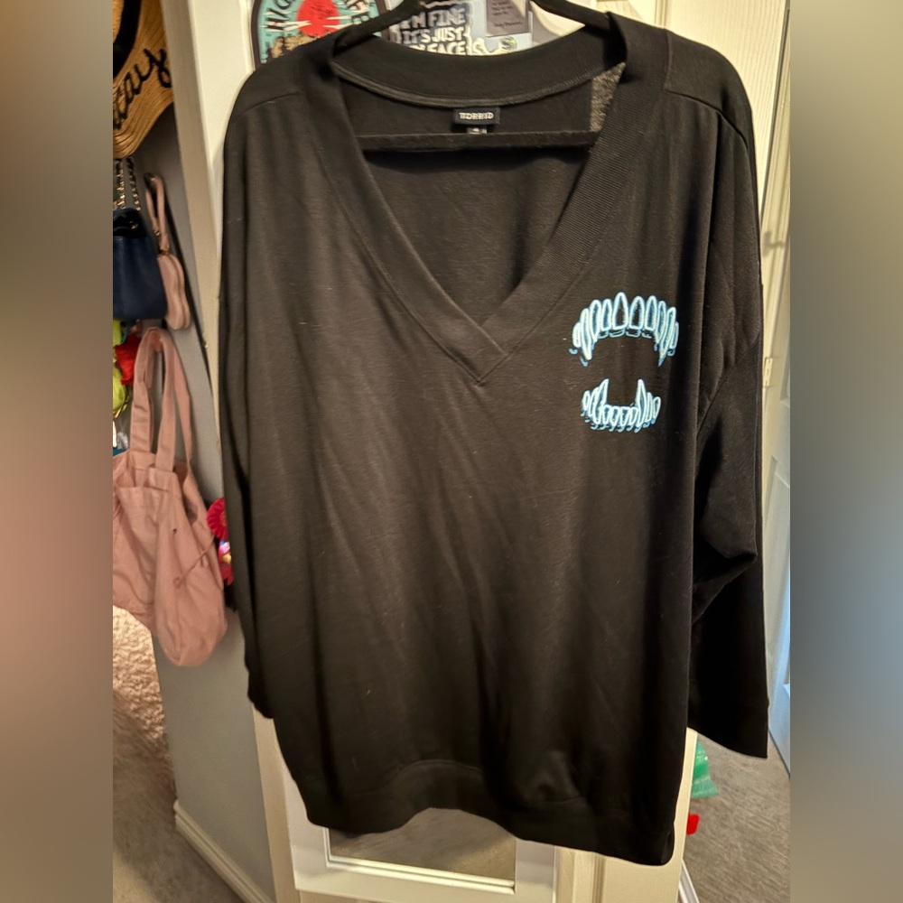 100- torrid 4 glow in the dark sweatshirt